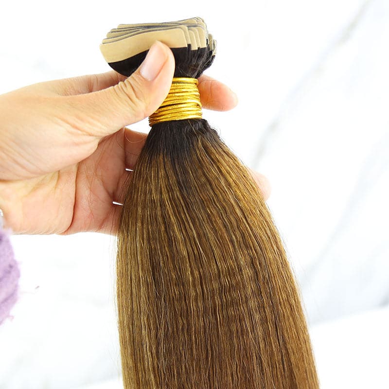 Blonde tape in hair extensions